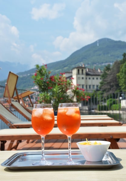 Aperol Spritz by the pool with mountain view