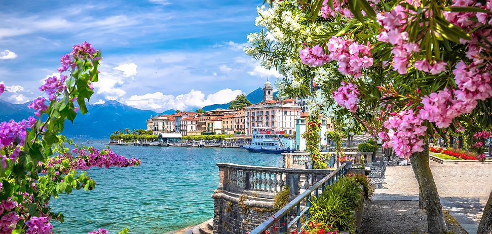 Lake Como promenade with flowers and Bellagio view